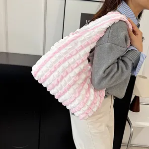 Pink white bubble shoulder bag detail view, casual soft cloud handbag with stylish texture.