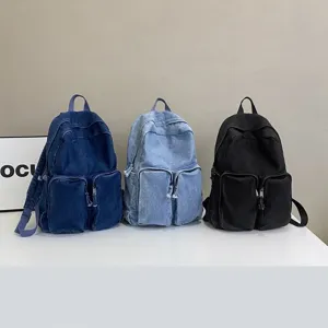 Casual retro denim backpack for daily school and outdoor use with spacious compartments.