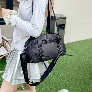 Black ballet style nylon shoulder bag with cute ribbon bows and ruffles for women daily use.