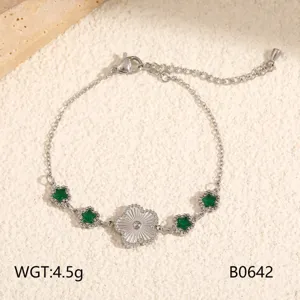 Stainless steel bracelet with green floral charms, chic EU/US style jewelry for women.
