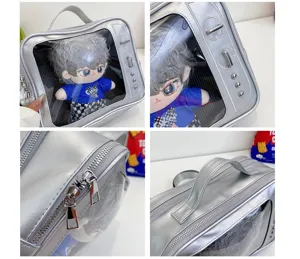 Clear detail view of silver transparent window doll pain bag, versatile cross-body shoulder design.