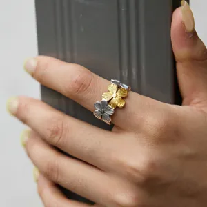 Stainless steel flower ring for women, trendy two-tone adjustable fashion jewelry chic.