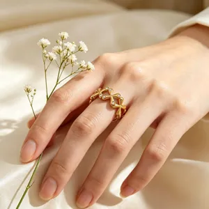 Elegant stainless steel gold ring with sparkling cubic zirconia crystals for women fashion jewelry.