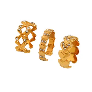 Stainless steel gold plated rhinestone ring set featuring chic cross geometric and heart stacking designs.