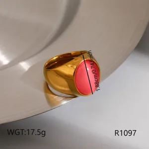 Gold stainless steel ring with pink oval stone fashion minimalist jewelry detail shot