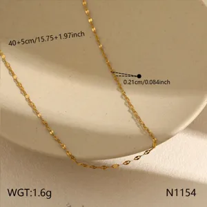 Detail view of minimalist stainless steel clavicle necklace with delicate gold chain links.