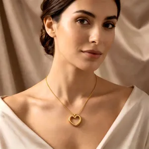 Gold heart pendant necklace detail, chic minimalist 18k gold titanium steel clavicle chain.
