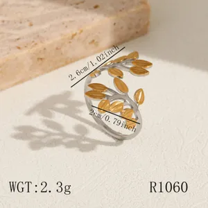 Stainless steel open ring with chic leaf design and dual-tone finish showing dimensions.