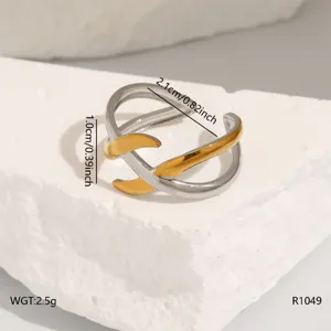 Stainless steel open crossover ring, stylish minimalist two-tone finger jewelry for women.