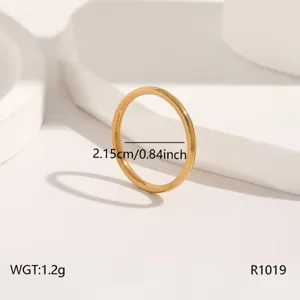 Minimalist gold stainless steel plain ring for women, lightweight stackable band.