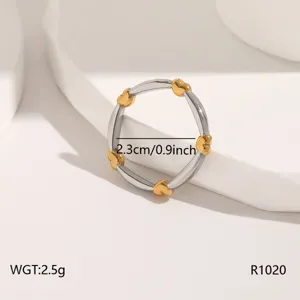 Stainless steel dual color heart ring minimalist fashion jewelry for women elegant daily wear.