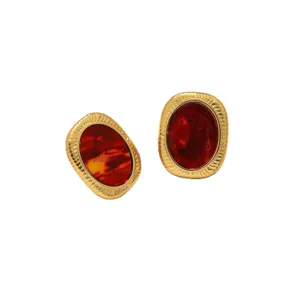 Vintage Maillard style oval stainless steel earrings with red stone and retro gold trim design.