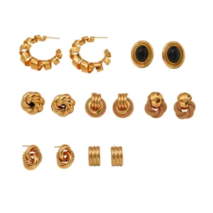 Set of vintage gold stainless steel geometric stud earrings, trendy chic jewelry collection.