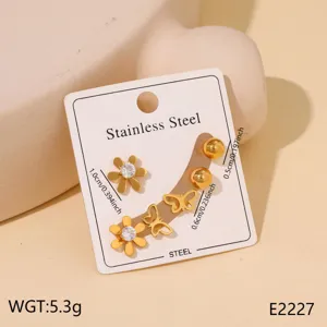Stainless steel stud earrings set featuring elegant flower and butterfly designs for women.