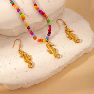 Chic summer marine style colorful beaded necklace and gold seahorse pendant earrings set.