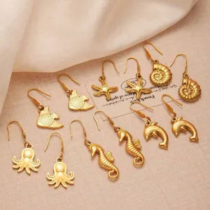 Gold marine theme earrings set featuring cute octopus starfish and seahorse pendants for summer.