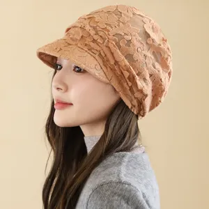 Detail view of the elegant lace breathable newsboy sun hat for women, fashionable style.
