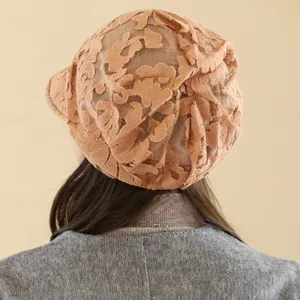 Spring Korean fashion lace breathable newsboy cap covering grey hair floral hollow hat detail.