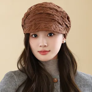 Brown lace duckbill hat for women, breathable hollow out beret for spring and autumn daily wear.