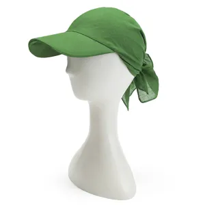 Green sun hat detail showcasing the stylish rear scarf knot design and soft fabric texture.
