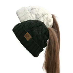 Dames winter gebreide paardenstaart muts knot kabelbreisel hoed casual warme skimuts