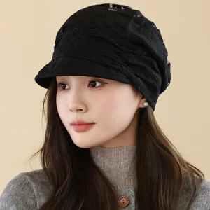 Detailed view of the elegant black lace hollow breathable peaked cap for daily wear.