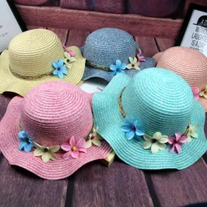 Colorful woven straw sun hat with floral decoration and braided band for women and girls beach wear