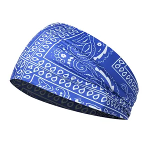 Blue paisley headband detail view, elastic athletic hair band for yoga and running workouts.