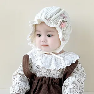 Cute baby lace bonnet for infant girls, soft cotton floral hat for spring and autumn outdoor wear.