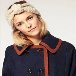 Cozy knitted winter headband detail, chunky cable knit ear warmer for women, warm hair accessory.