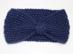 Dark blue knitted winter headband with a cozy bow design for warm and stylish daily wear.