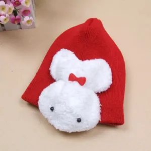 Cute red baby knit hat with fluffy white rabbit face and red bow design, warm infant winter cap.