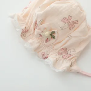 Cute baby girl cotton sun hat with lace trim and rabbit bow print for toddler infants.