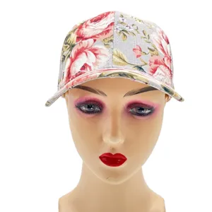 Detailed view of the floral print baseball cap showcasing the elegant rose pattern.