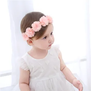 Close-up of the cute pink five flower baby headband, soft chiffon infant hair accessory.