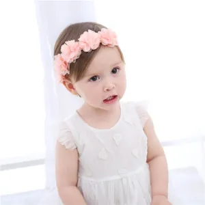 Cute baby pink flower headband detail, soft chiffon floral design for infant photo props.