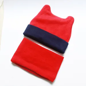 Knit baby hat and scarf set, red and navy blue winter warm toddler cap, detail view.