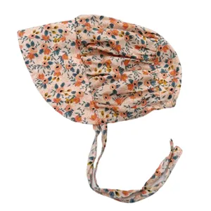 Vintage floral baby girl sun hat with chin ties, cute toddler bonnet detail view for spring.