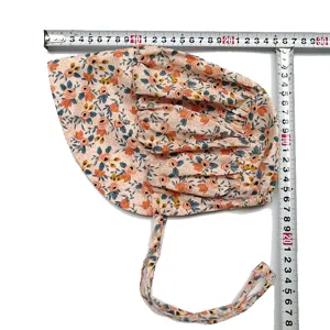 Cute floral baby bonnet sun hat with ties and ruffles, perfect for spring and autumn daily wear.