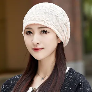 Close-up detail of a women lace chemo cap, floral mesh breathable design for comfortable daily wear.
