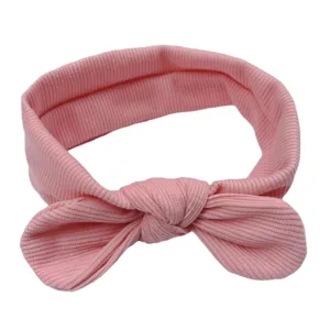 Fascia per neonati a costine rosa con fiocco, morbido accessorio per capelli in maglia.