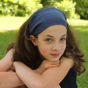 Detail view of a solid dark blue elastic pleated headband for women, soft daily hair accessory.