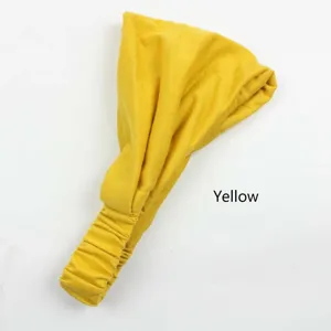Solid color yellow elastic pleated headband detail view, soft fabric for yoga and daily wear.