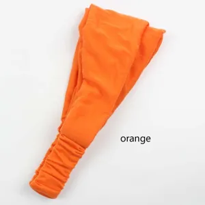 Solid color elastic ruched headband for women, soft yoga and makeup hair band detail view.