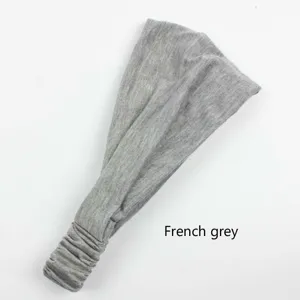 Grey elastic ruched headband detail shot, comfortable daily workout hair accessory.