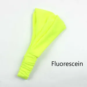 Detailed view of neon yellow elastic headband, solid color women's hair accessory for daily use.