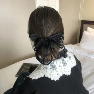 Elegantes schwarzes Spitzen-Haarband fuer Damen, vielseitiges Haaraccessoire im Sommer.
