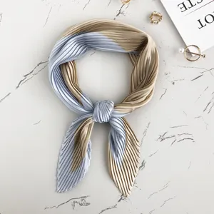 Chic pleated small square scarf with elegant beige and light blue color block design.