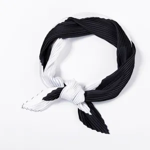 Black and white pleated silk scarf chic hair band small square neck accessory detail view.