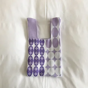 Knitted tote bag for women, purple geometric pattern casual handbag, portable woven shopping bag.